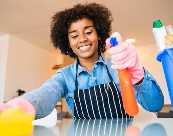 close-up-young-afro-woman-cleaning-new-home-housekeeping-cleaning-concept_58466-12493