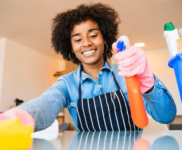 close-up-young-afro-woman-cleaning-new-home-housekeeping-cleaning-concept_58466-12493